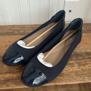 Navy pumps. Brand new. Lots of support for all day wear.